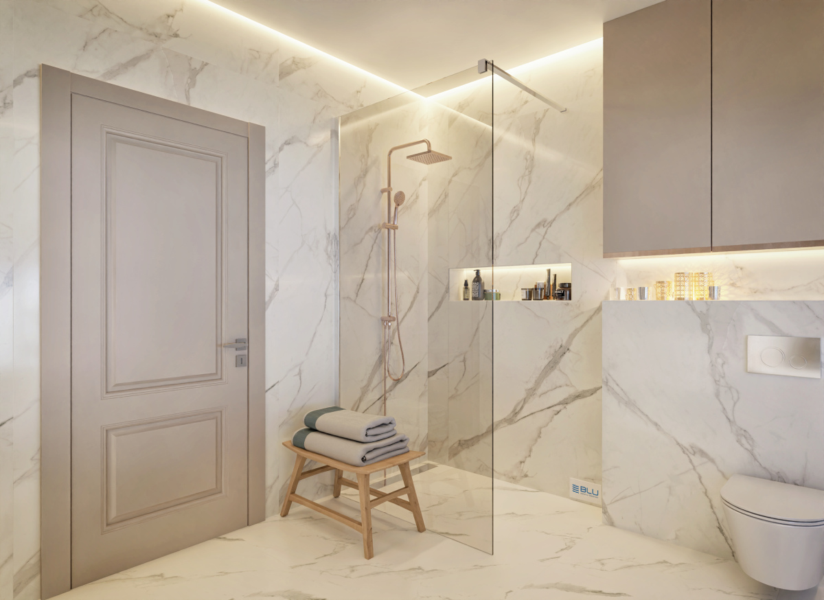 Marmurowy salon kąpielowy z kabiną walk-in.